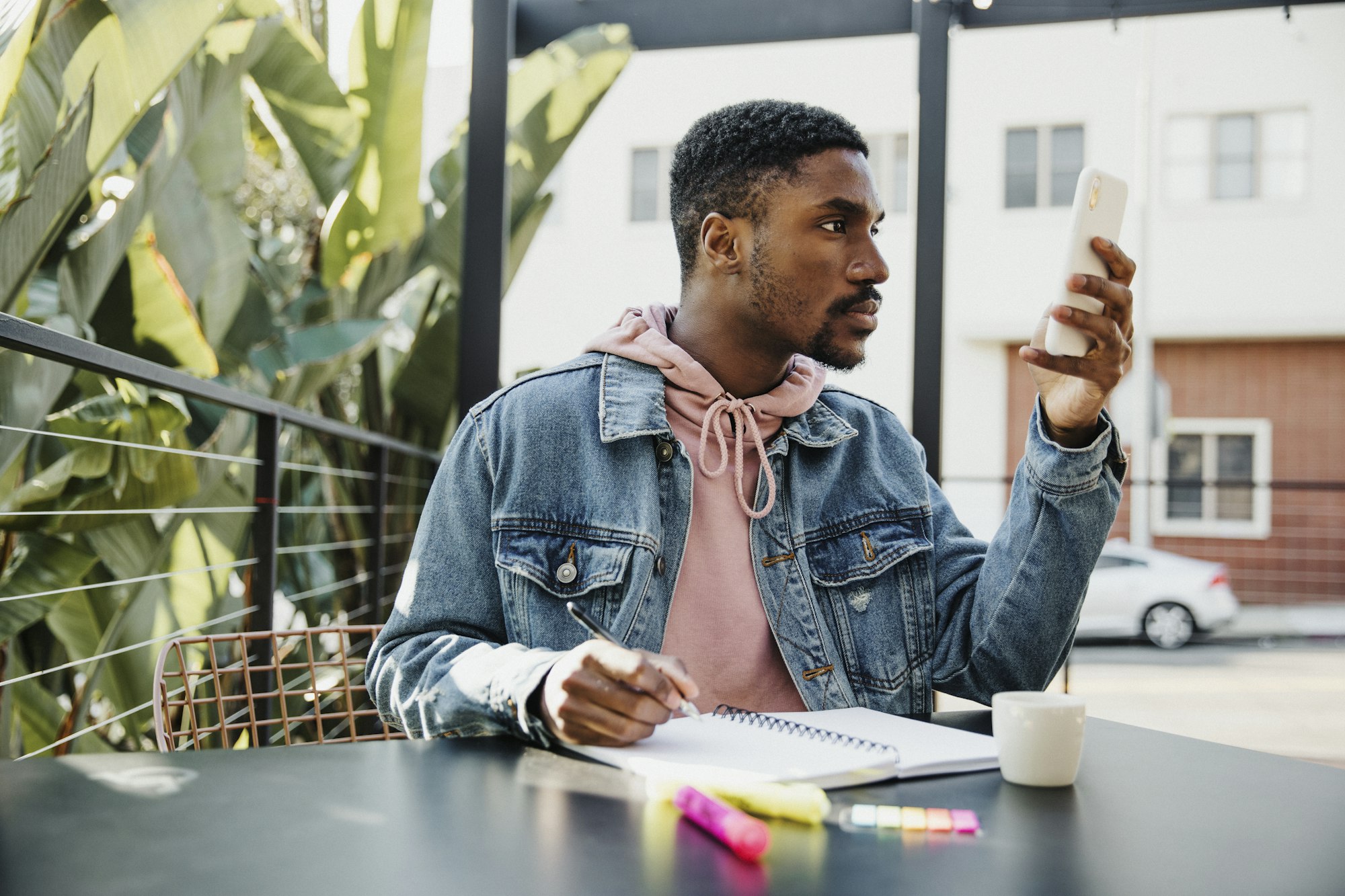 Man getting distracting by phone